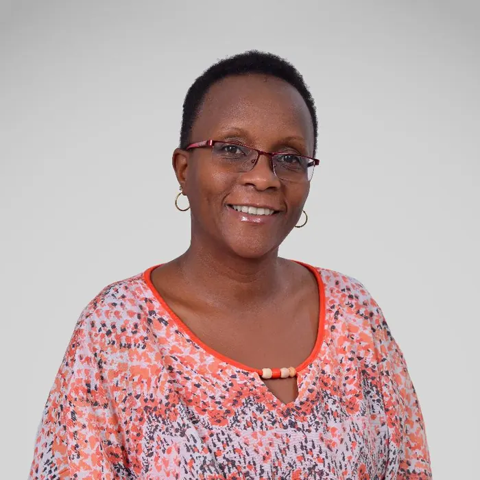 Portrait of Maria Kamau smiling